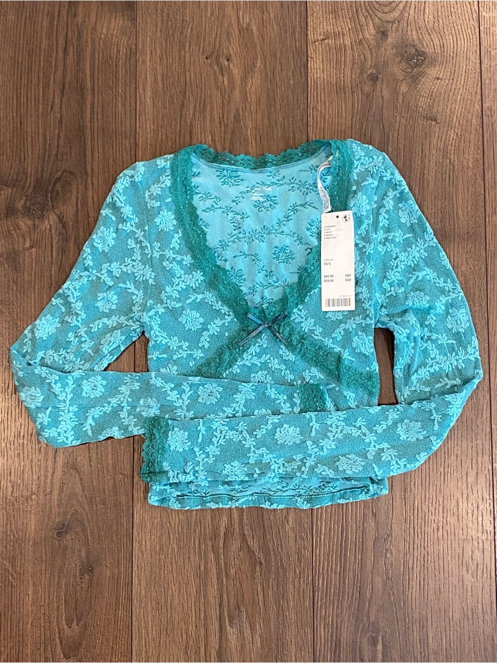 NWT, out from under from Urban Outfitters Teal Long Sleeve Lace Crop Top